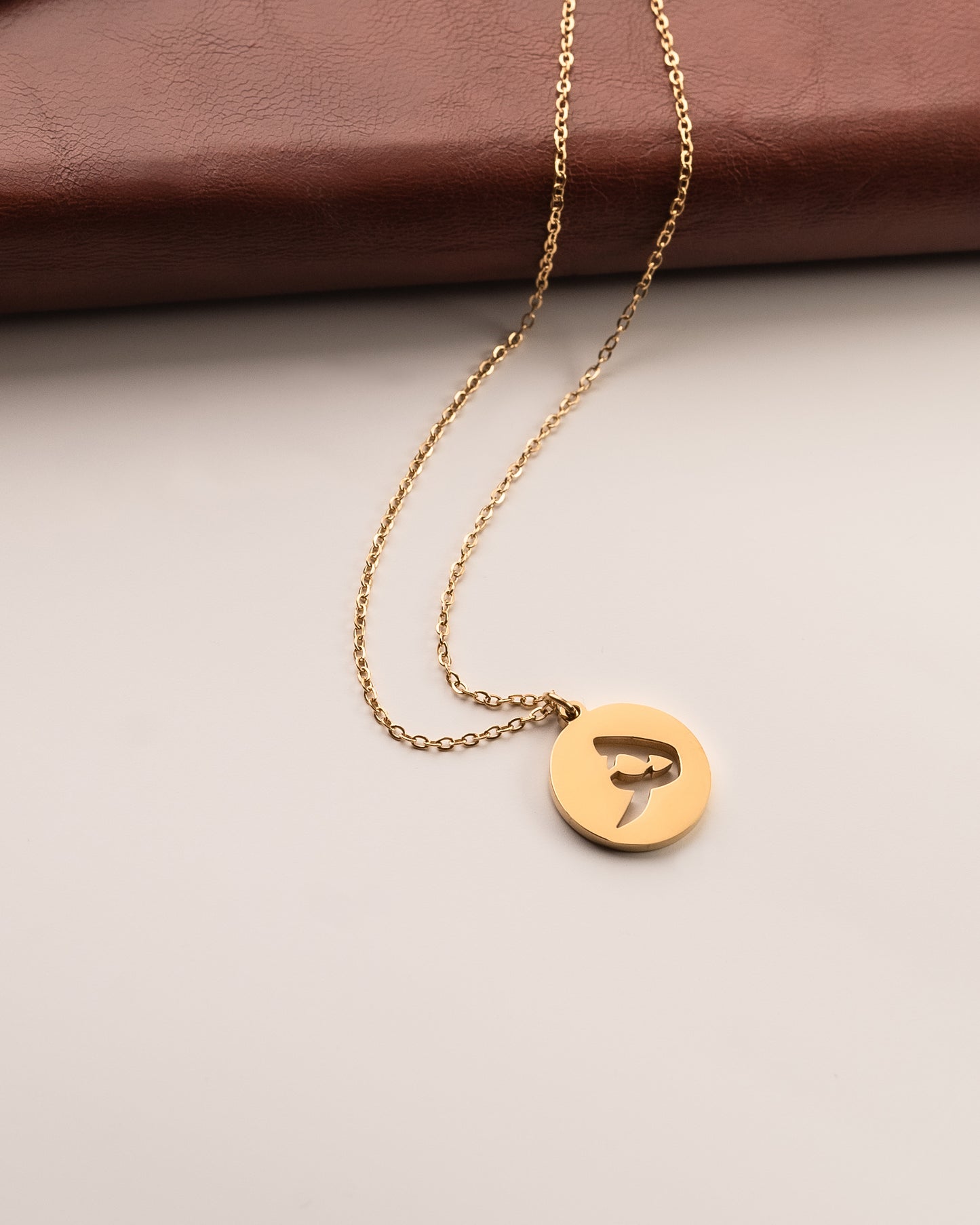 Initial Necklace ھ