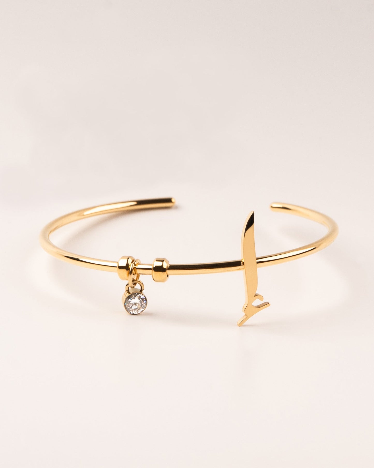 Initial Cuff إ