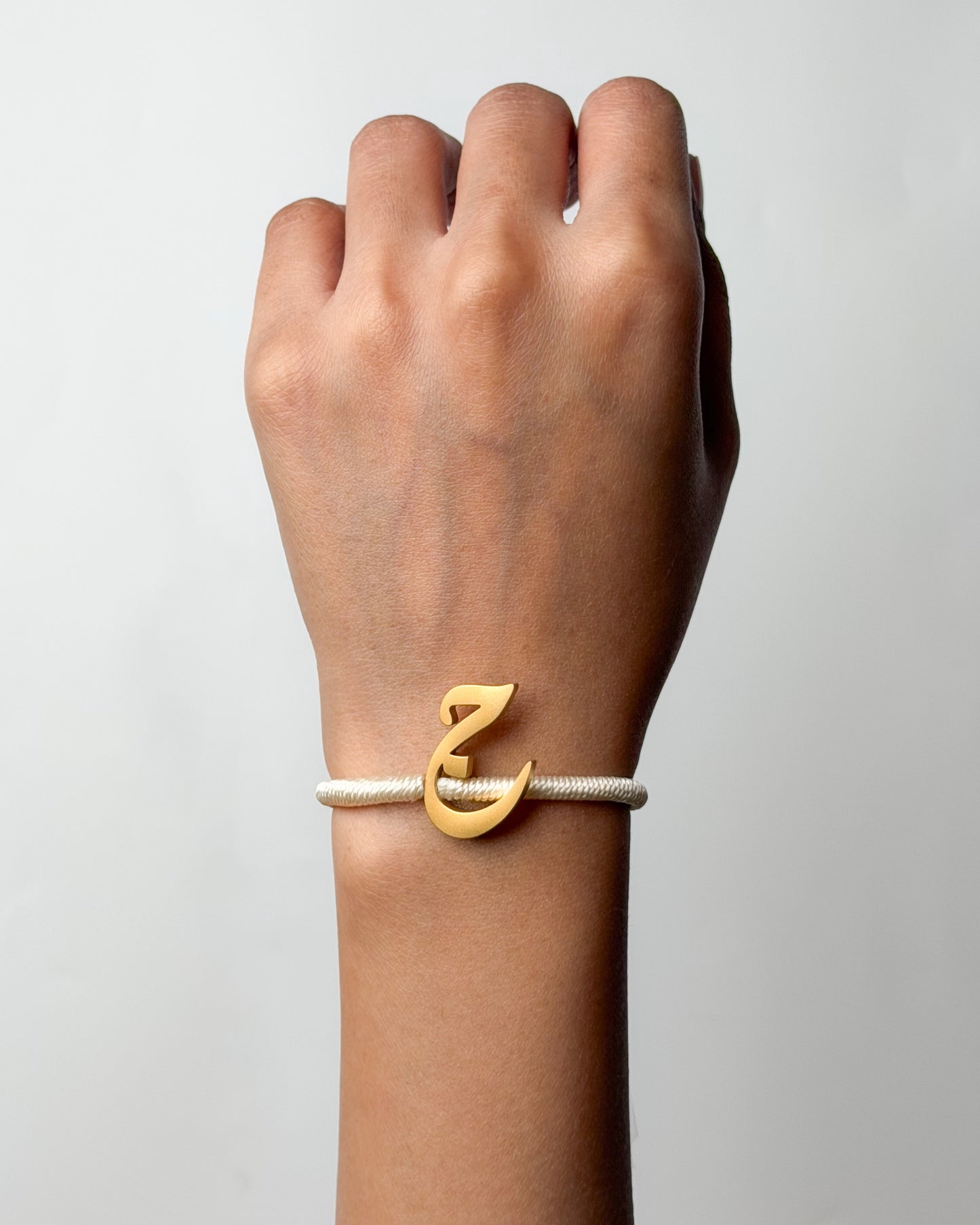 String Initial Bracelet ج