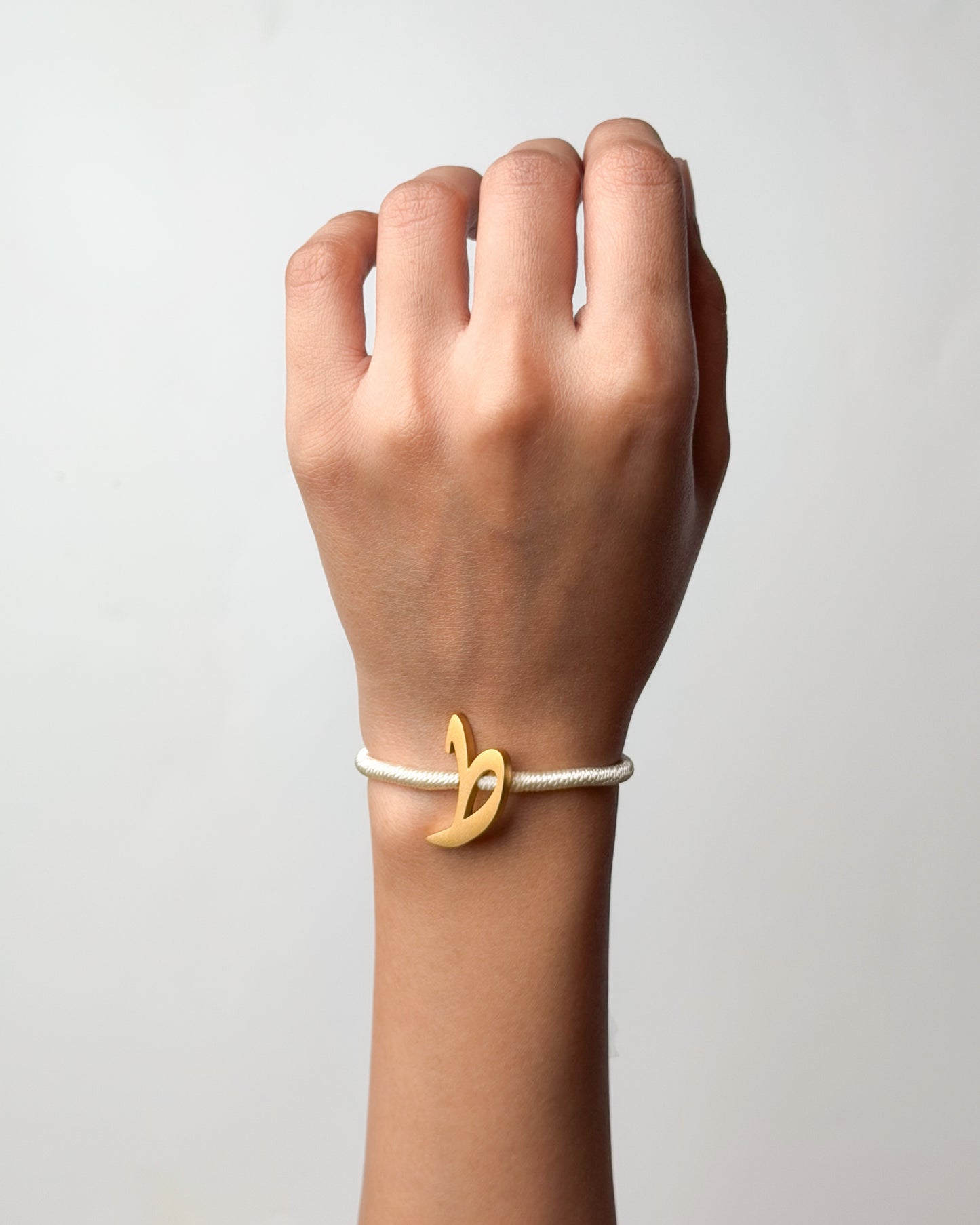 String Initial Bracelet ط